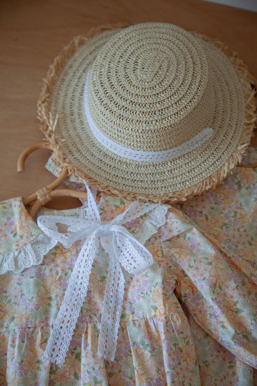Straw Hat With White Crochet Lace Ties