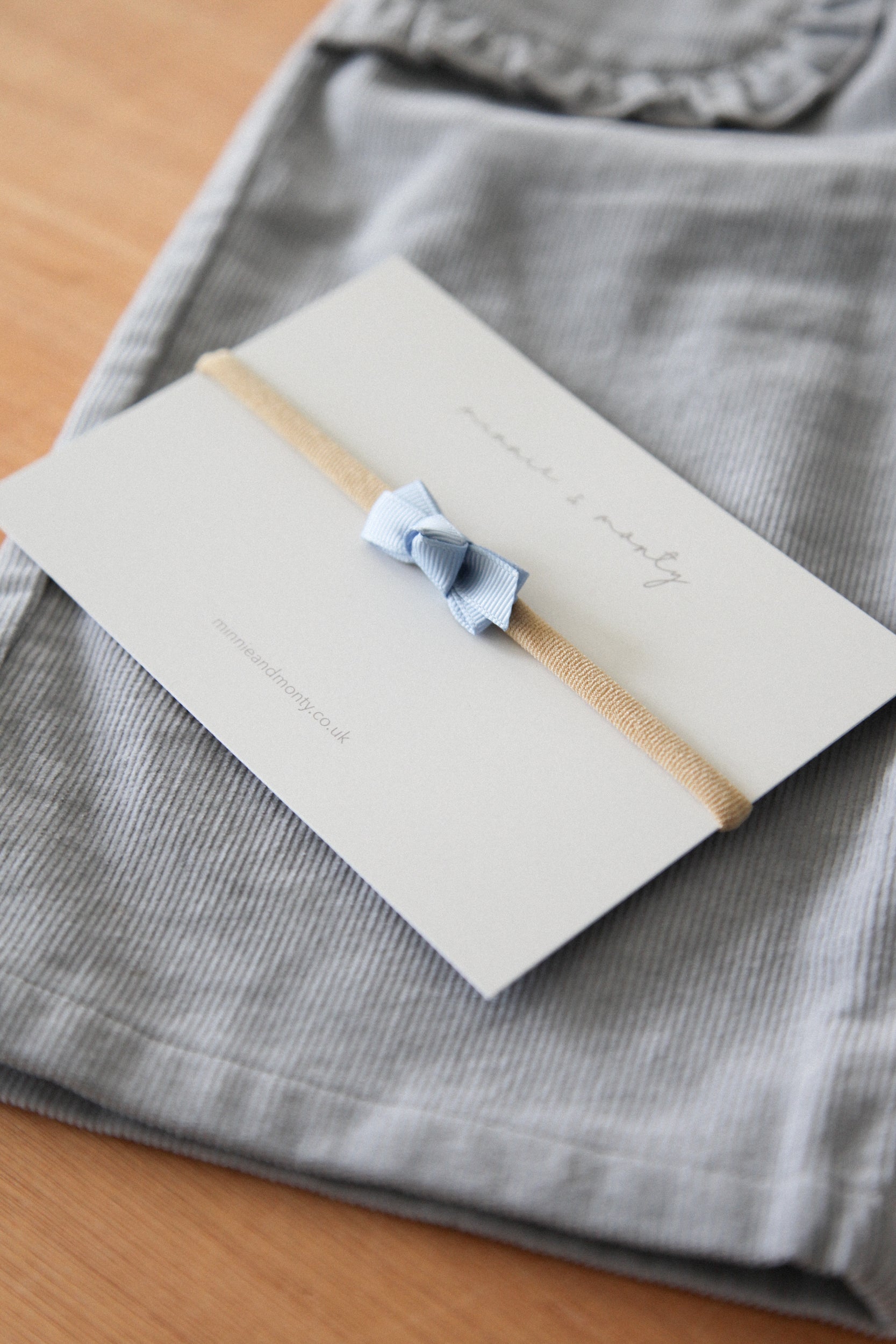 Dainty Mini Bow Headband in Sky Blue