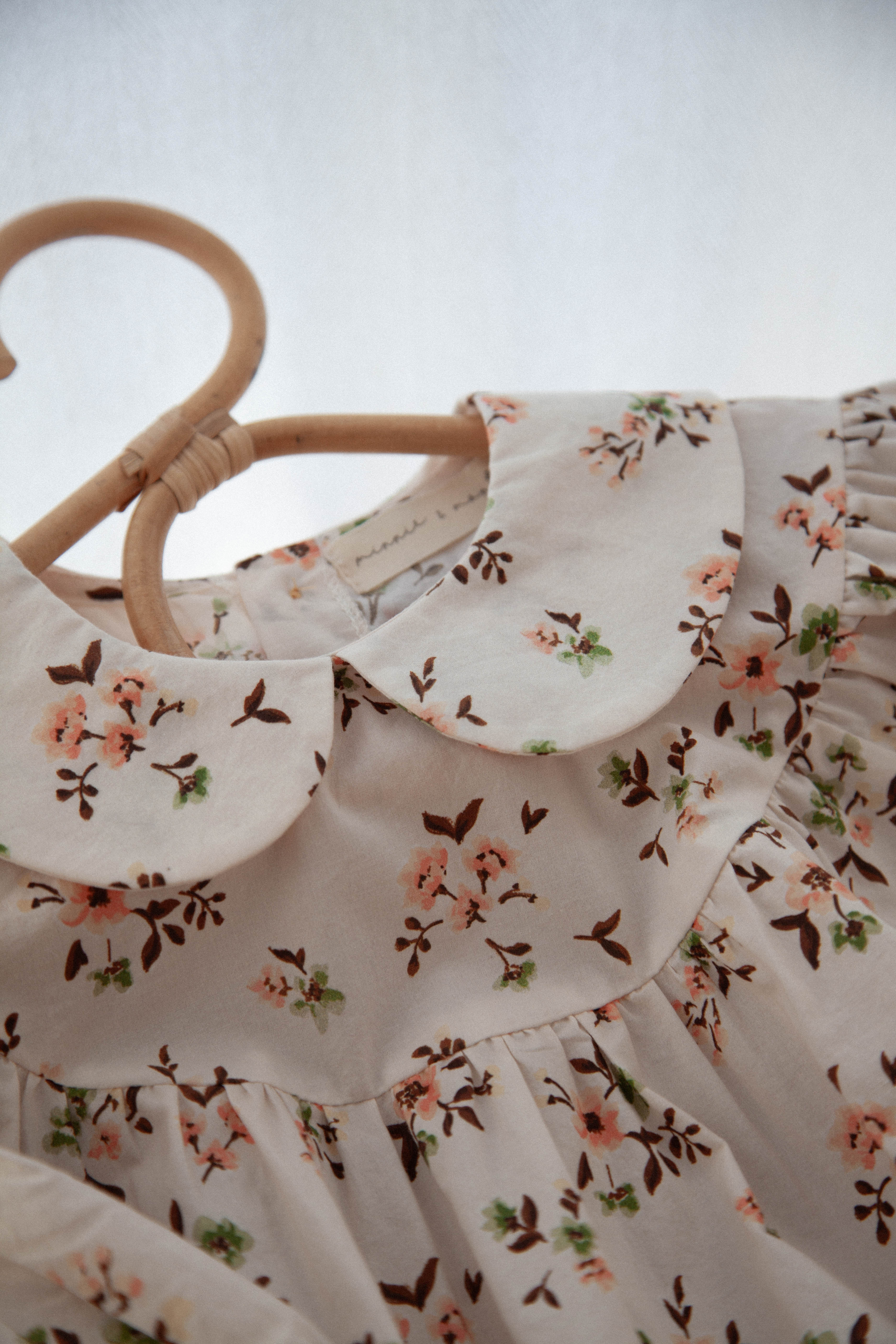 Mocha/Floral Long Sleeve Romper