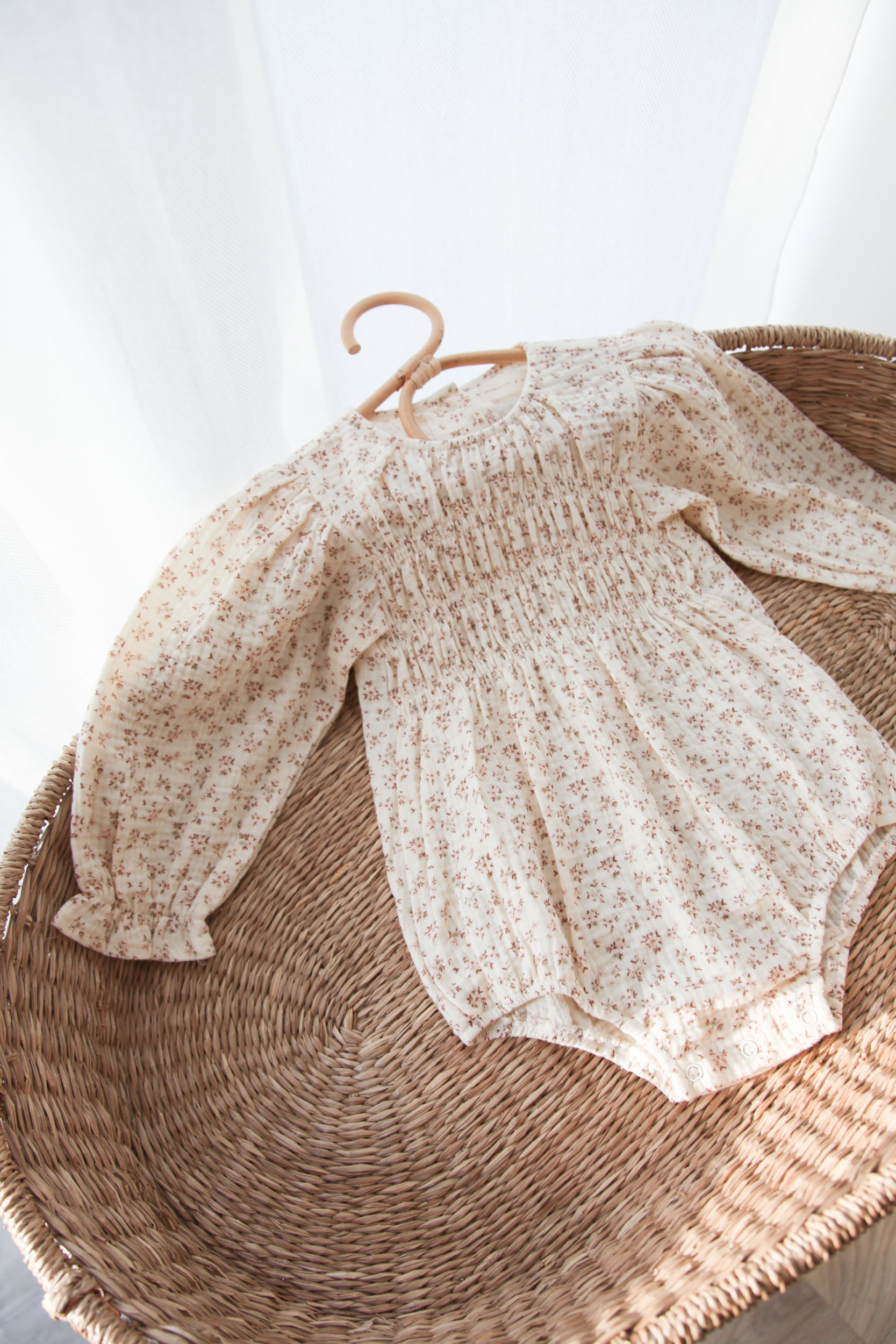WHOLESALE Ditsy Floral/Buttermilk Muslin Smocked Long Sleeve Romper