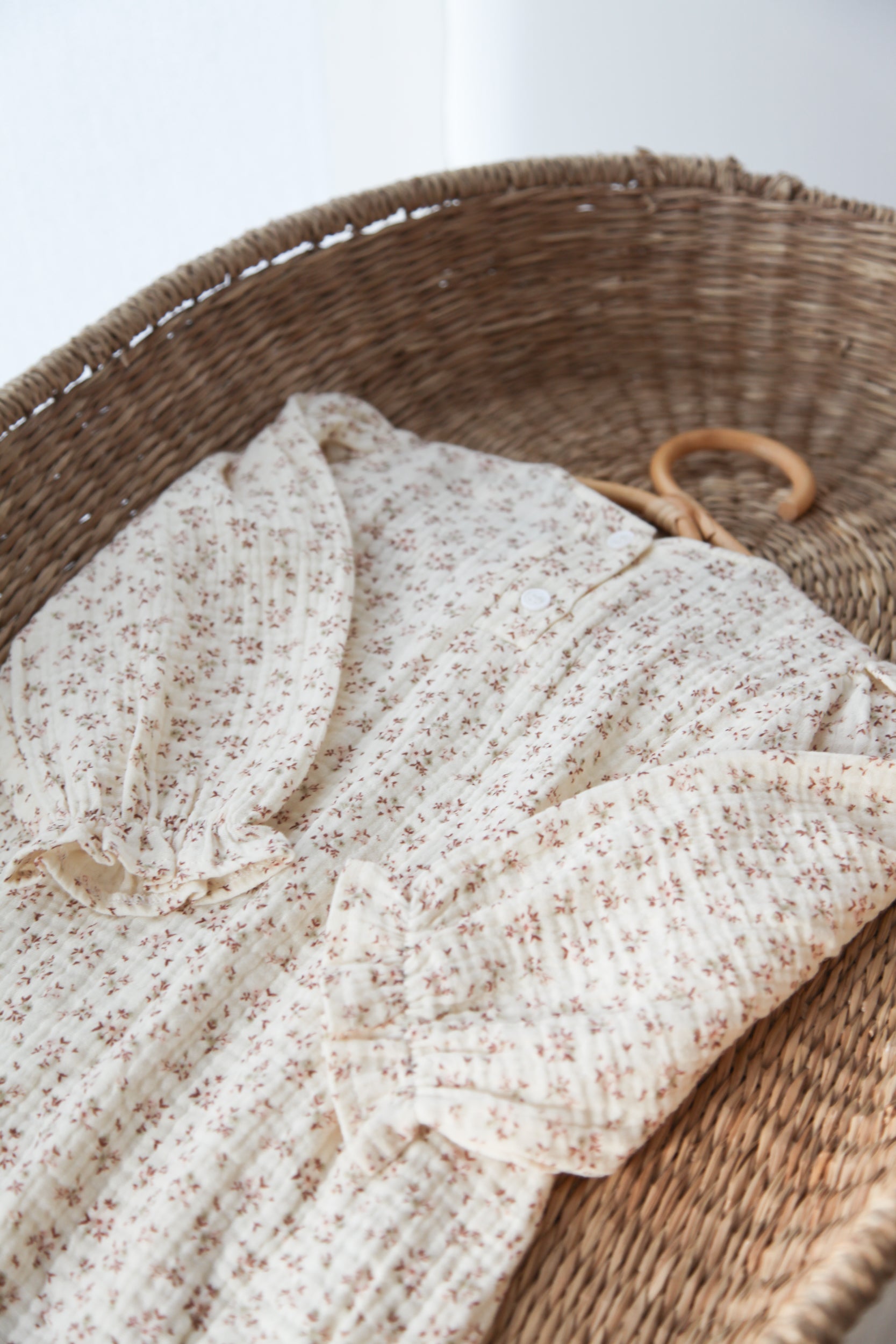 WHOLESALE Ditsy Floral/Buttermilk Muslin Smocked Long Sleeve Romper