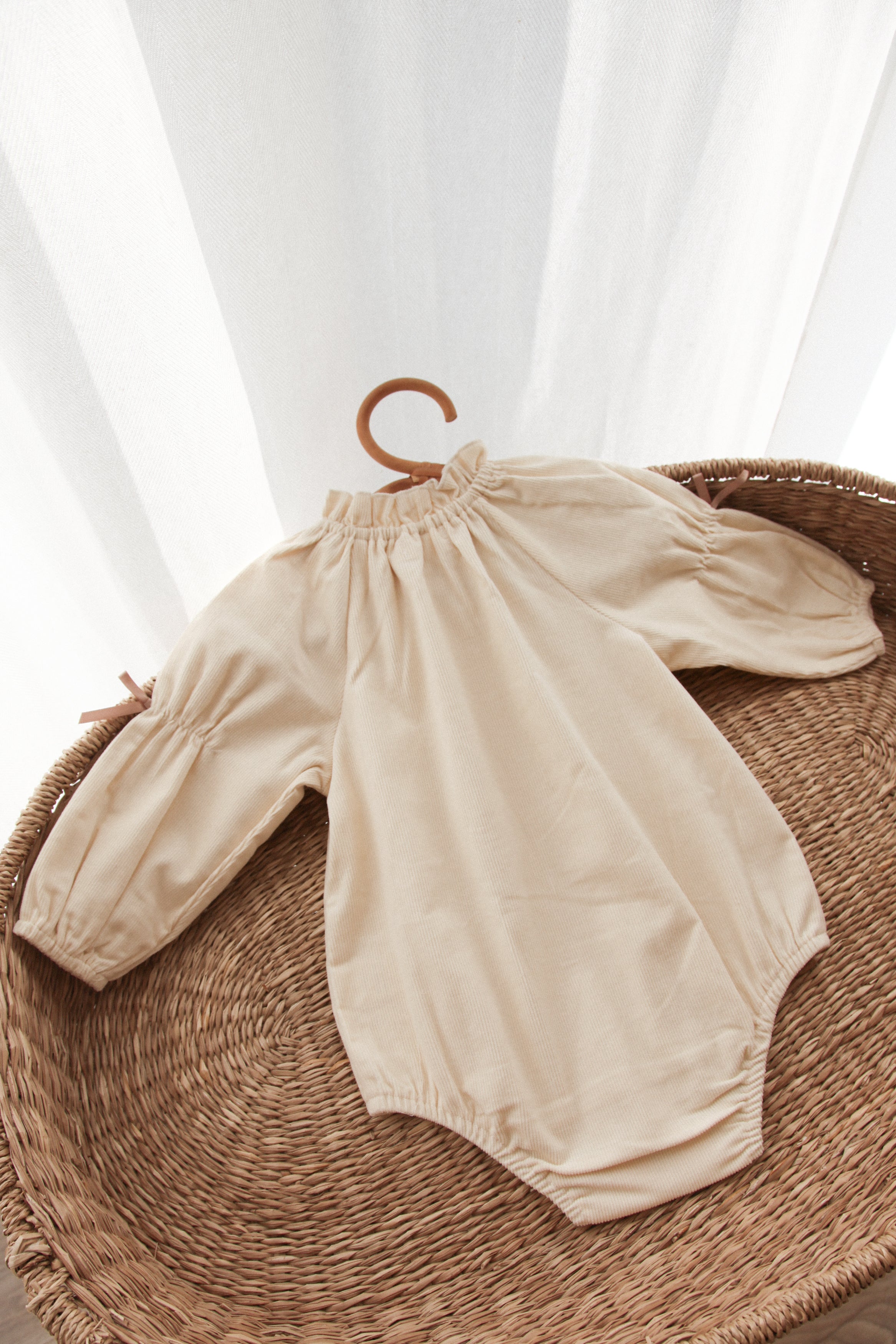 WHOLESALE Cream/Cord Bow Long Sleeve Romper