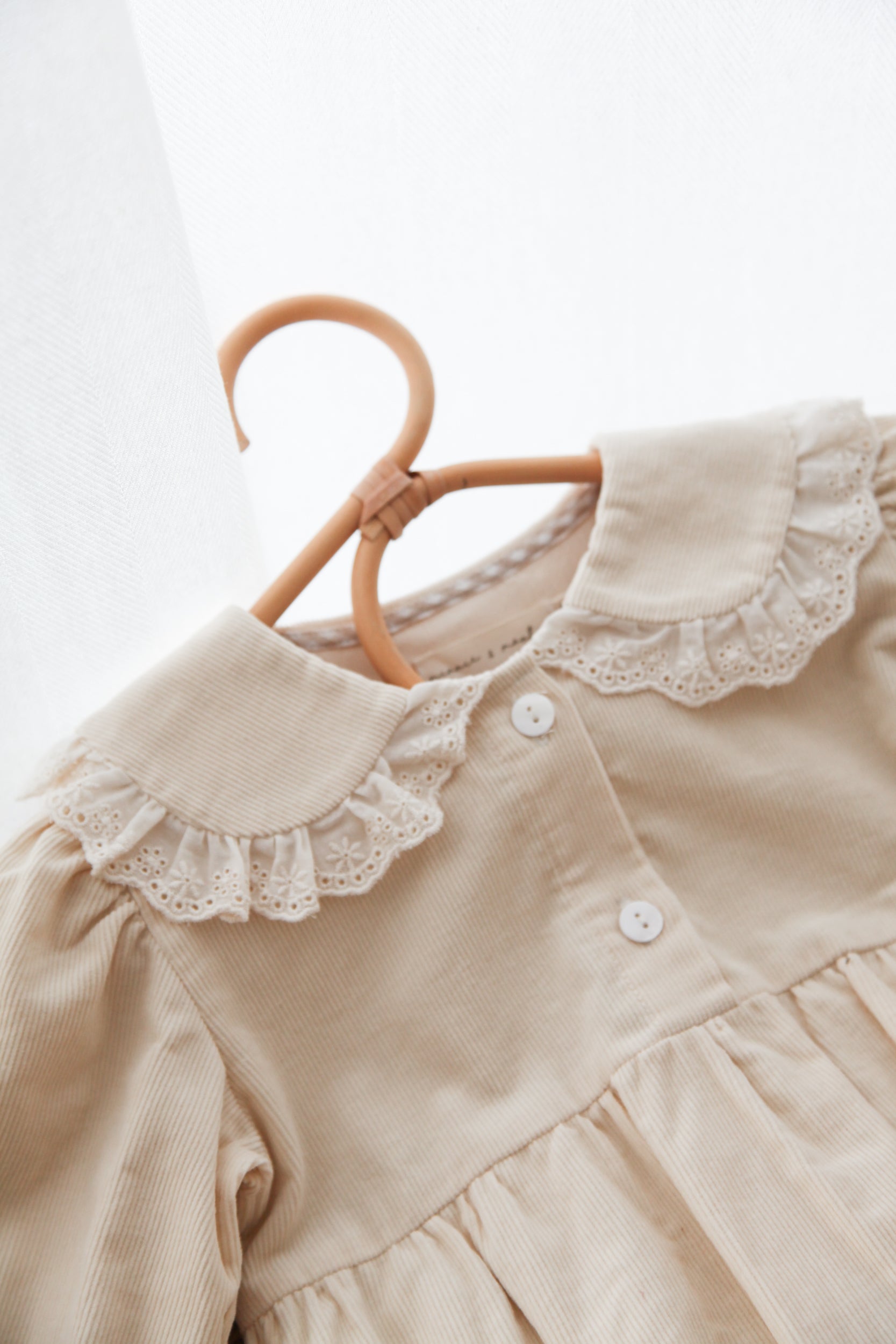 WHOLESALE Cream/Cord Oversized Broderie Frill Collar Romper