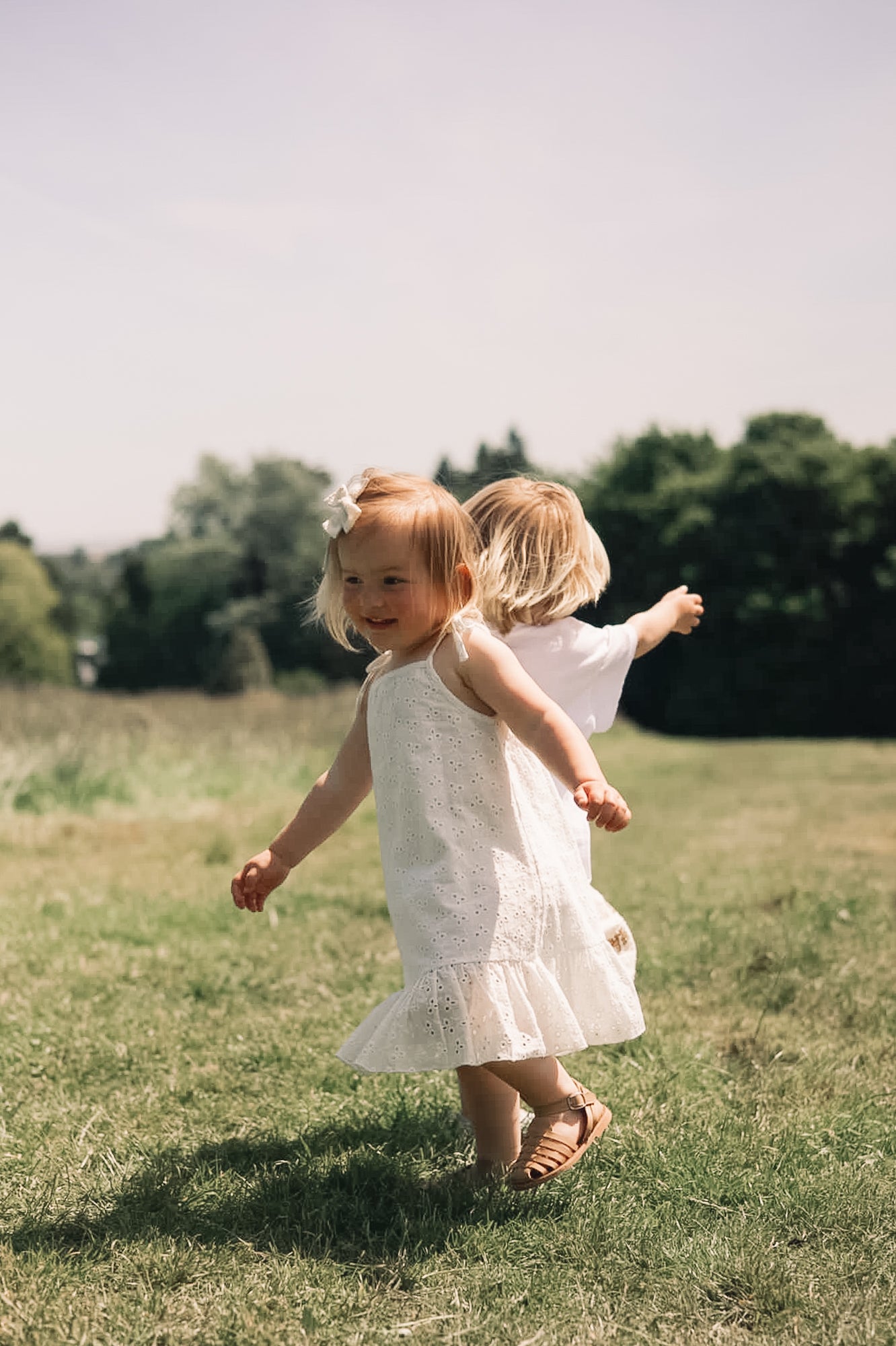 Minnie and Monty Tie Shoulder Frill Dress in White Broderie Anglaise