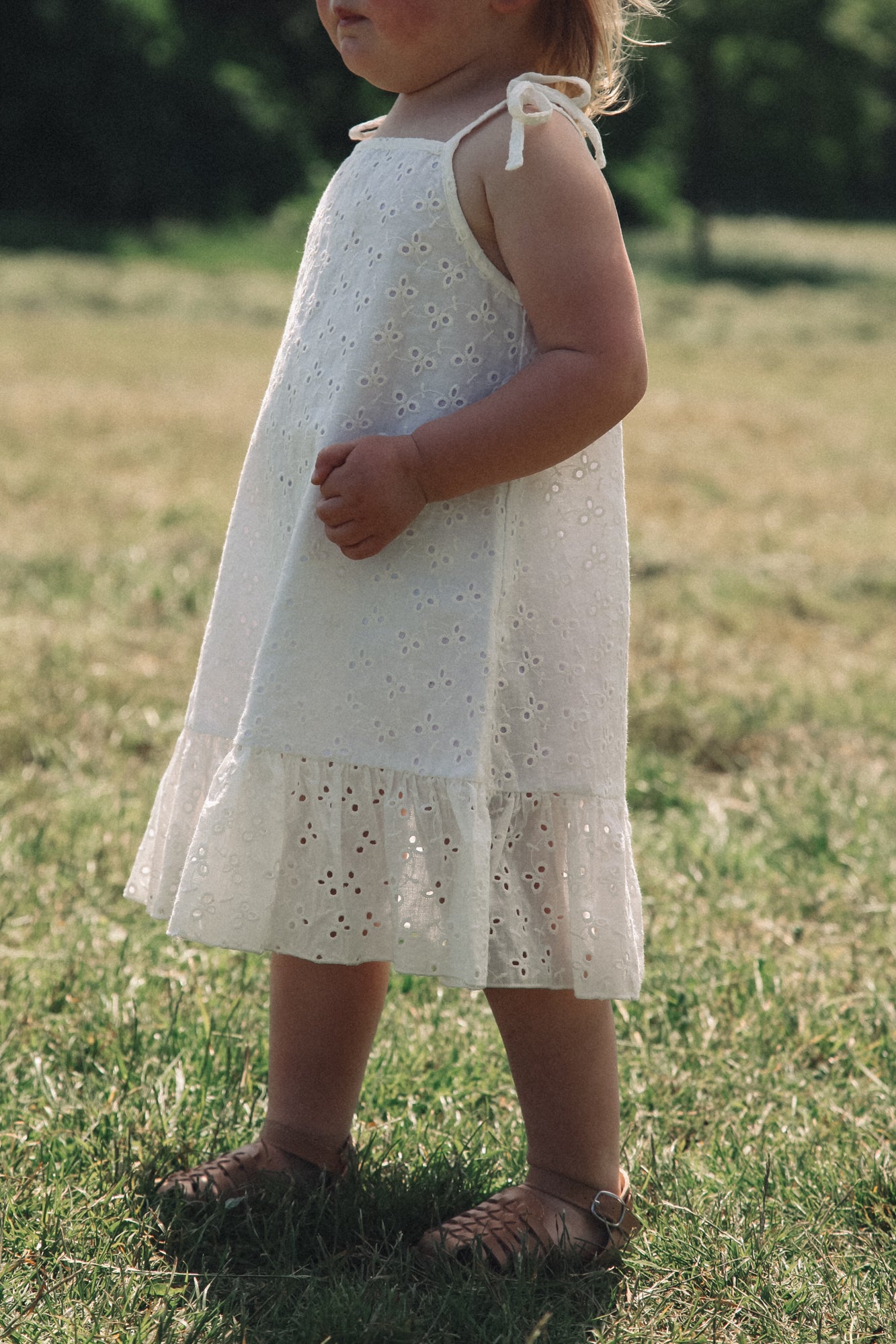 Minnie and Monty Tie Shoulder Frill Dress in White Broderie Anglaise